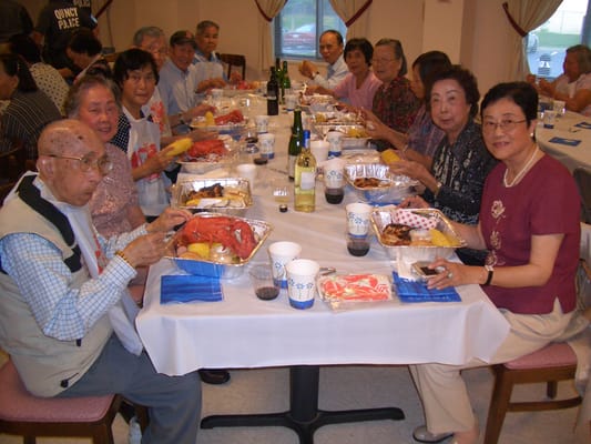 Residents enjoying a meal in a dining area