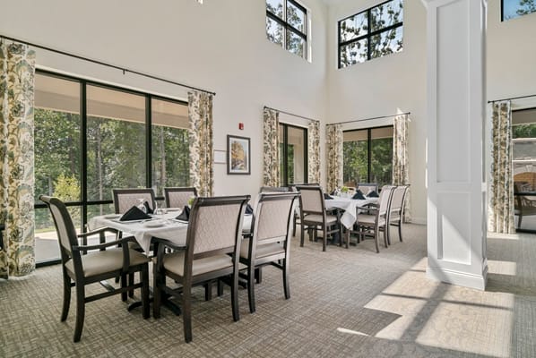 Bright dining room with elegant table settings