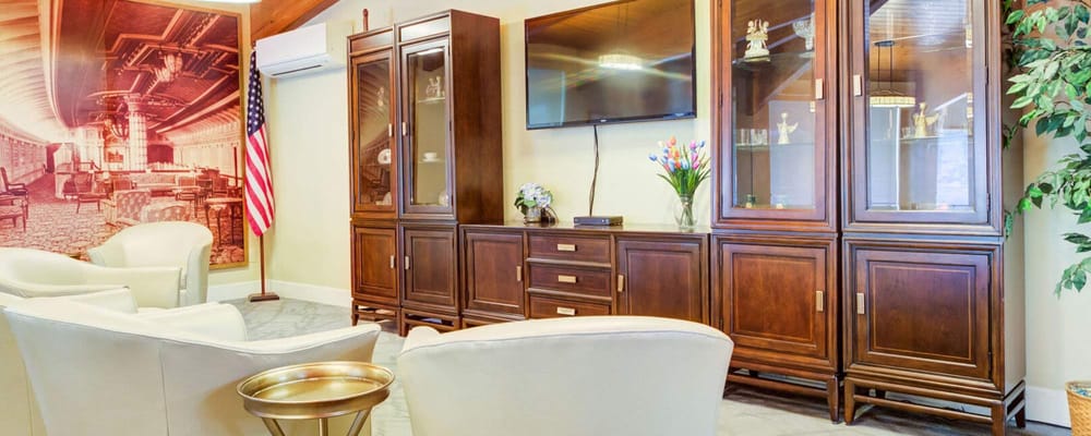 A well-furnished common area with comfortable seating