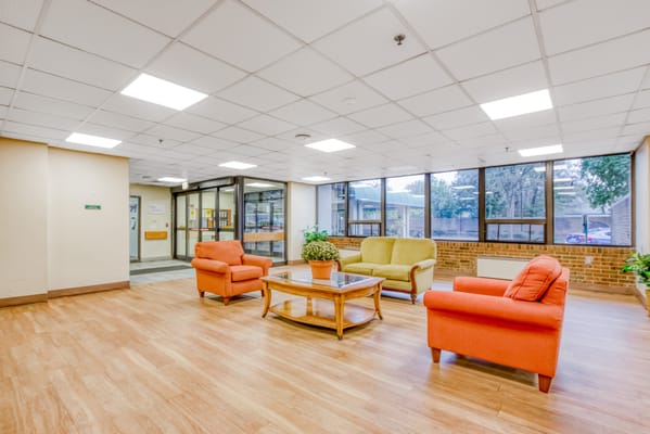 Common area with seating in a senior living facility