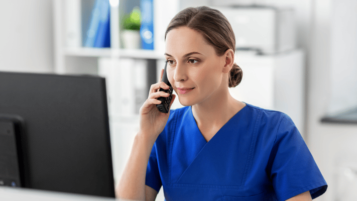 Staff member on the phone in an office setting