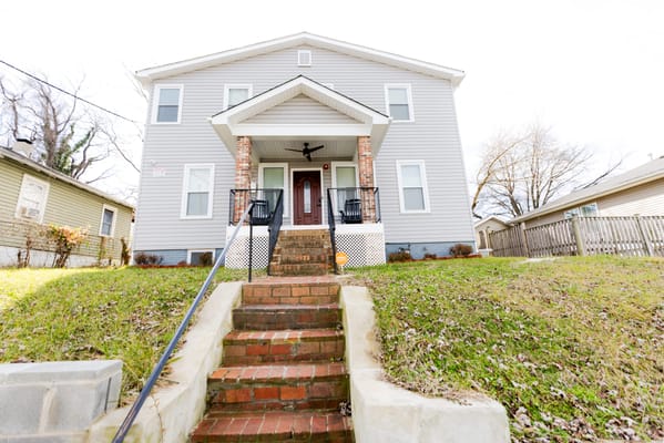 Exterior view of a residential building with steps