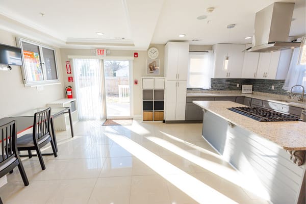 Bright, modern kitchen area in assisted living facility