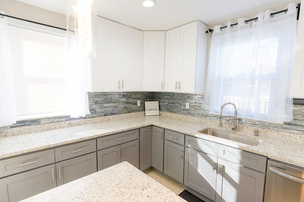 Bright kitchen area with modern cabinets and countertops