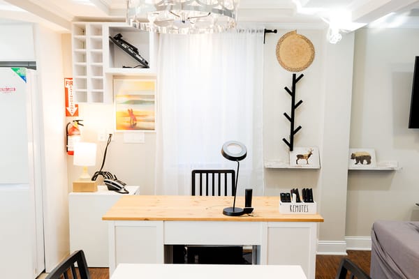 Bright interior space with a wooden desk and decor