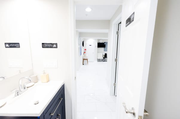 Interior view of a resident bathroom with polished fixtures
