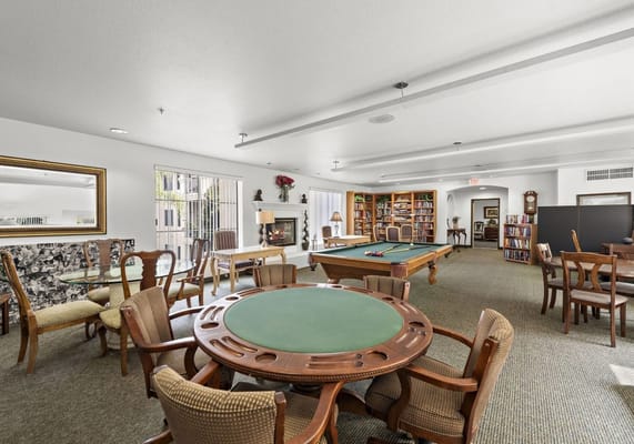 Common area with seating and a pool table