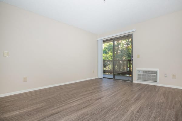Empty interior room with a sliding glass door