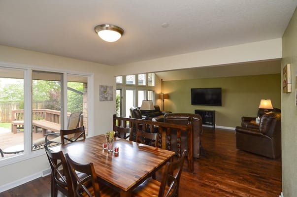 Cozy dining area overlooking a patio