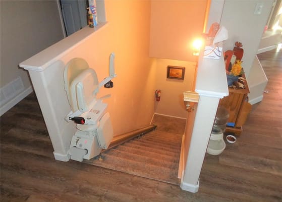 Stair lift on stairs leading down