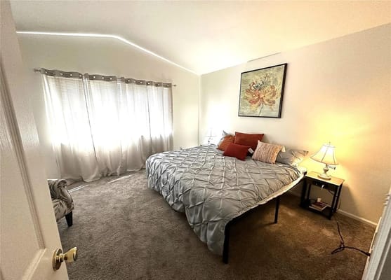 Bright and cozy bedroom with natural light.