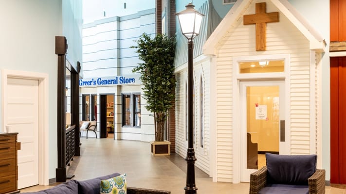 Interior view of a common area with a general store theme