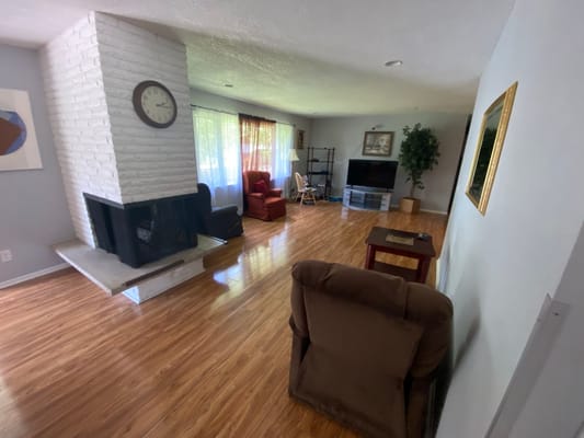 Cozy living area with seating and a fireplace