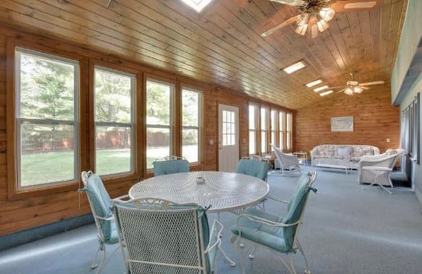 Bright, inviting common area with natural light and seating