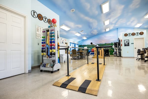 Interior view of an activity room with exercise equipment