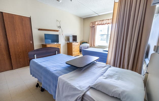 Interior of a shared resident room with two beds