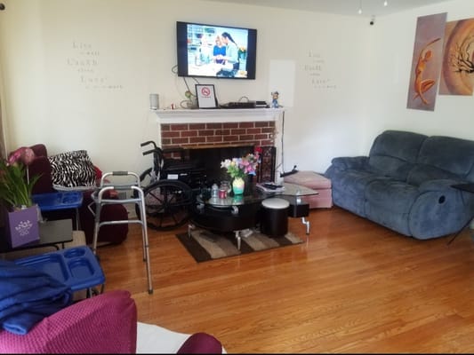 Inviting living room with comfortable seating and a television.
