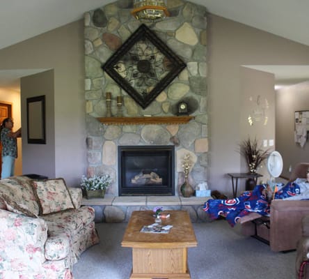 Cozy common area with a fireplace and comfortable seating