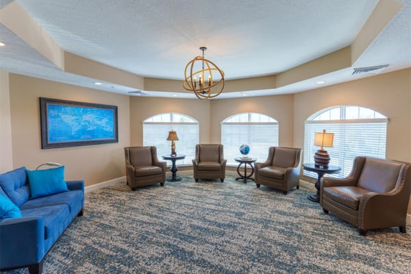 Cozy lounge area with armchairs and seating