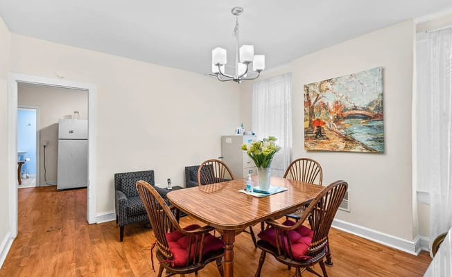 Bright dining area with a table and chairs