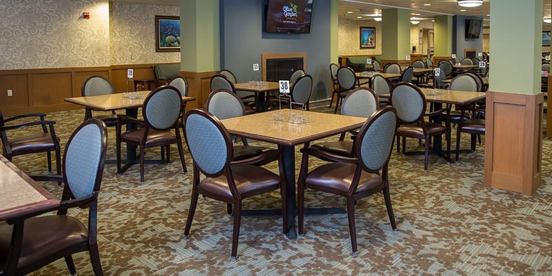 Dining area with empty tables and chairs