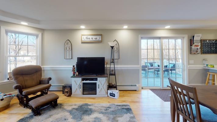 Cozy interior living space with seating and a TV