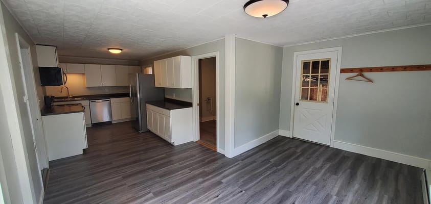 Spacious kitchen area with modern appliances