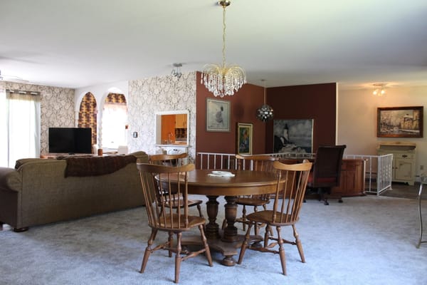 Spacious living area with a dining table and comfortable seating