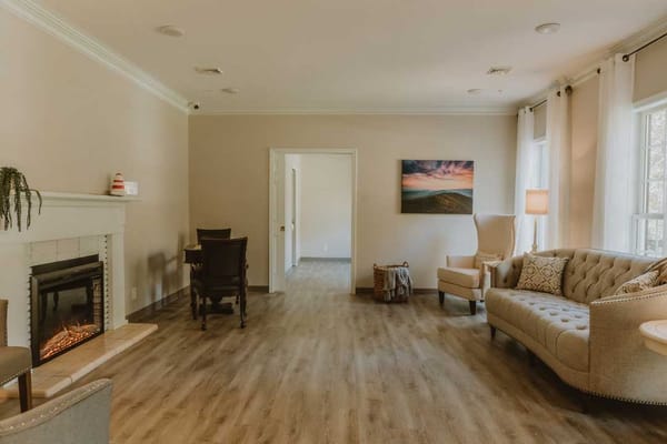 Cozy common area with seating and fireplace