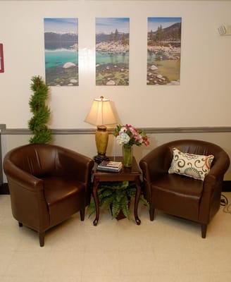 Cozy seating area with decorative pictures on the wall