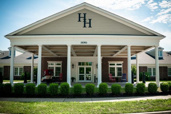 Exterior view of the facility with a covered entrance
