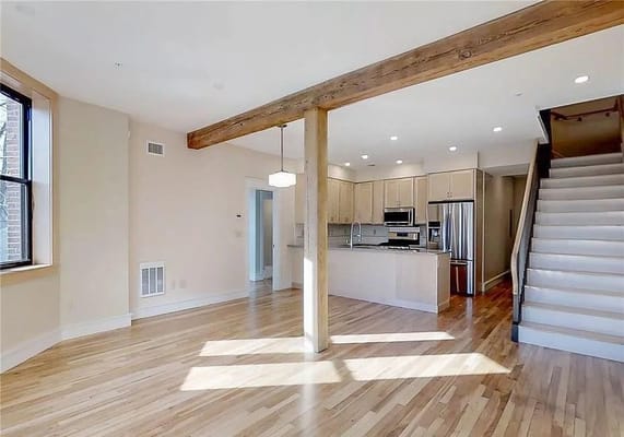Spacious interior living area with wooden accents