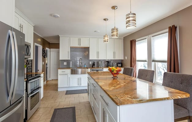 Spacious kitchen with a central island and modern appliances