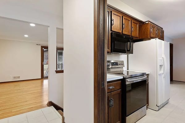 Modern kitchen with appliances and wooden cabinetry