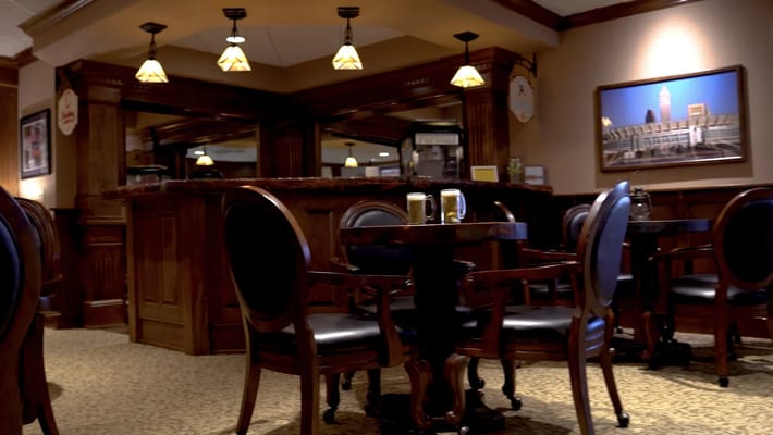 Cozy dining area with wooden furniture and lamps