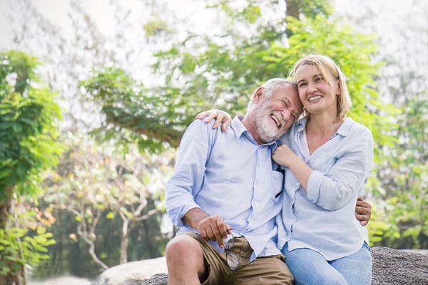 Couple enjoying a moment outdoors in a garden