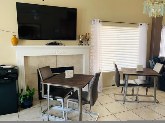 Common area with seating and a television