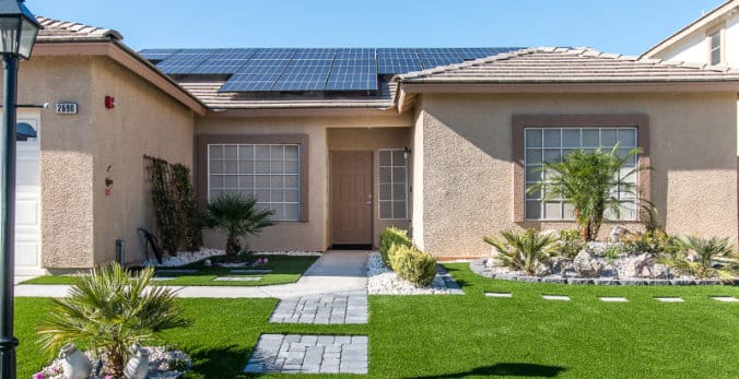 Exterior view of Henderson Care Home with solar panels