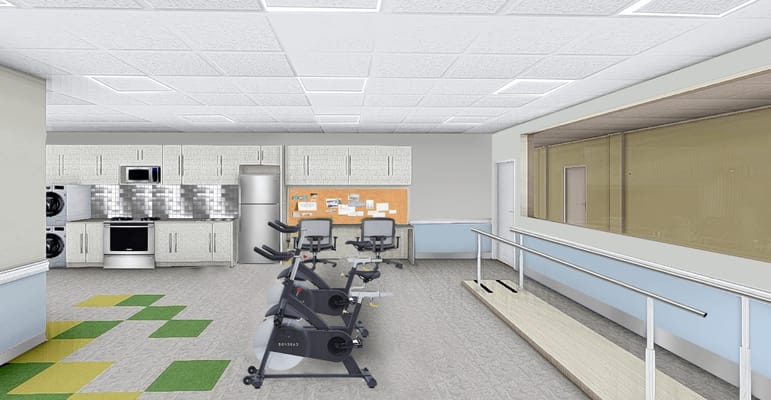 Well-equipped physical therapy room with exercise equipment
