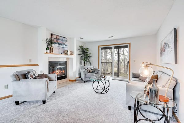 Comfortable living room with seating and fireplace