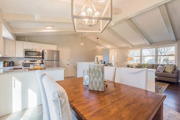 Bright kitchen and living room area in a senior living facility