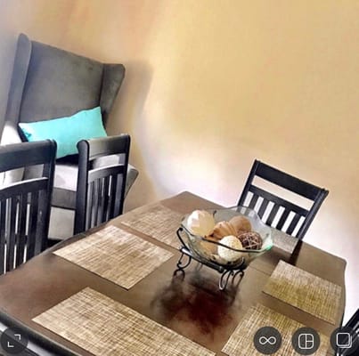 Interior dining area with table and decor