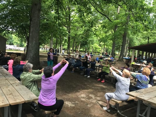 Residents participating in a group exercise outdoors