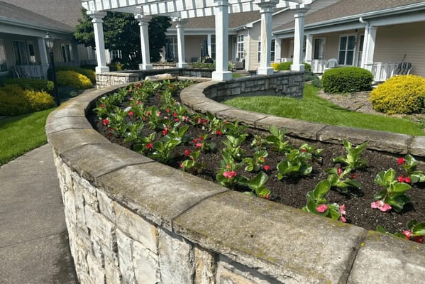 Flower bed with blooming plants at Crimson Ridge Meadows