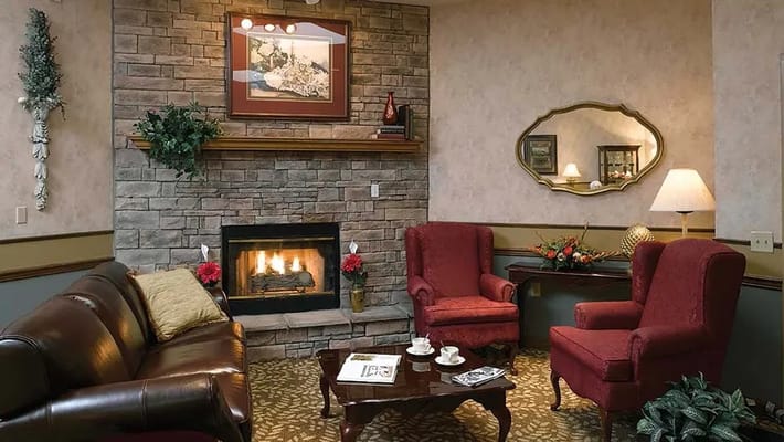 Cozy common area with a fireplace and comfortable seating