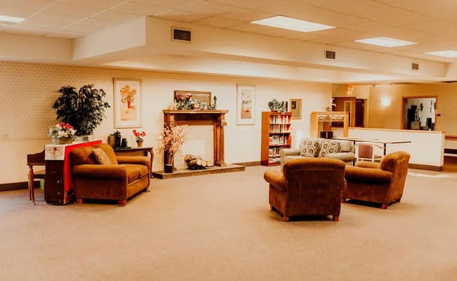 Cozy common area with seating in a senior living facility