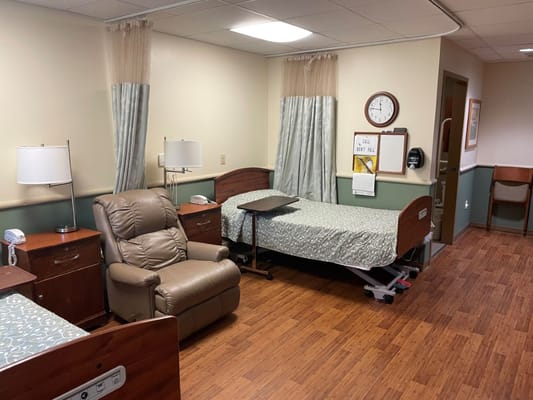 Interior view of a shared resident room with two beds