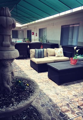 Outdoor seating area with seating and plants