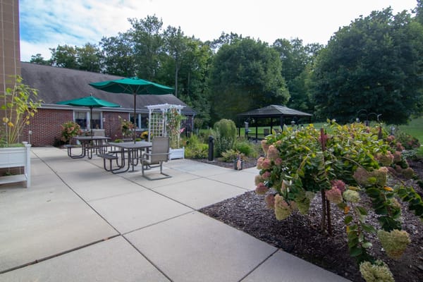 Outdoor garden area with seating and gazebo