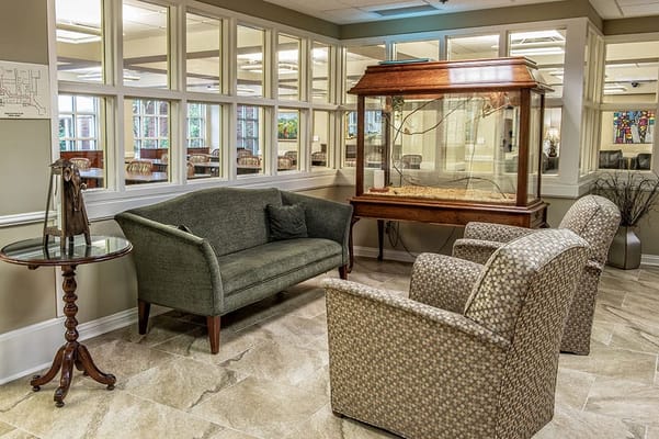 Cozy lounge area with seating and decorative elements